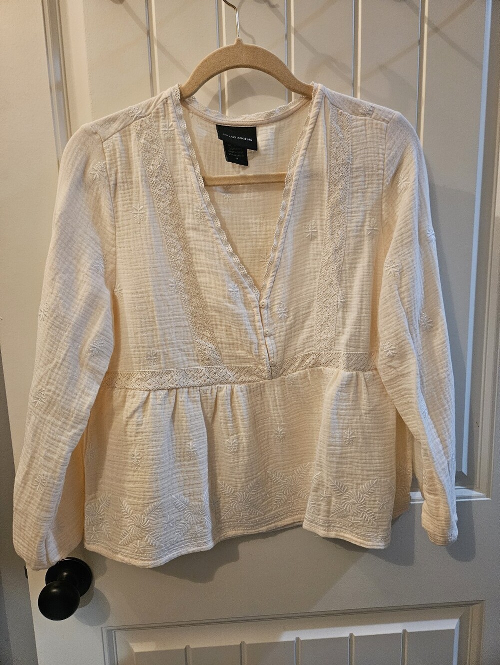 Cream Embroidered Peplum Blouse